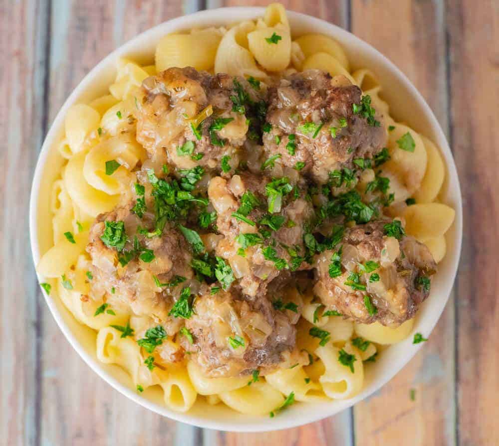 Salisbury steak meatballs covered in gravy and parsley