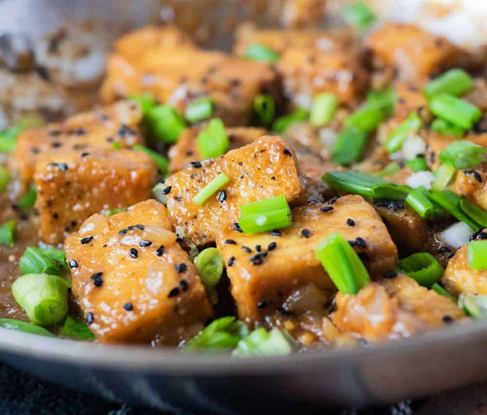 garlic ginger tofu readiny to eat and shining with garlic ginger sauce