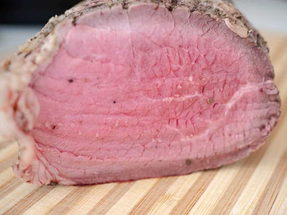 side shot of rare roast beef made in the Instant Pot