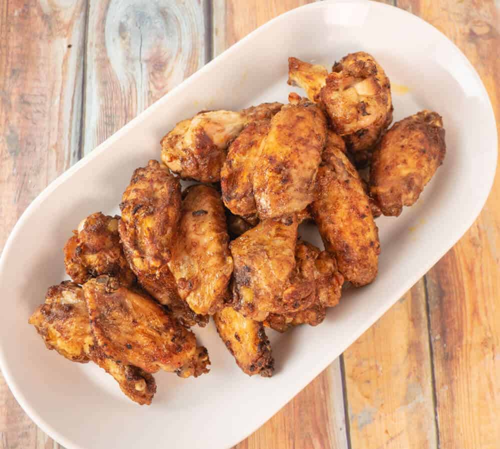 Overhead view of crispy and spicy golden brown jerk wings