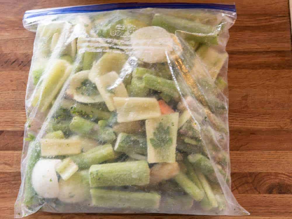 freezer bag full of vegetable scraps leftover