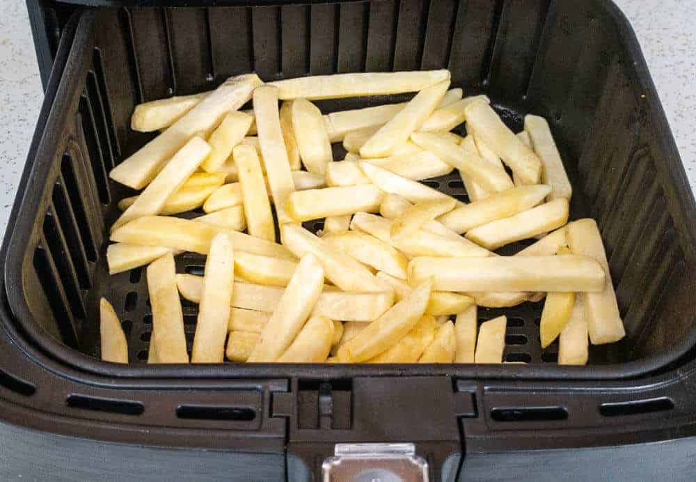 Frozen french fries in air fryer basket