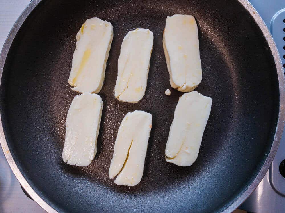 Halloumi Cheese in pan being fried