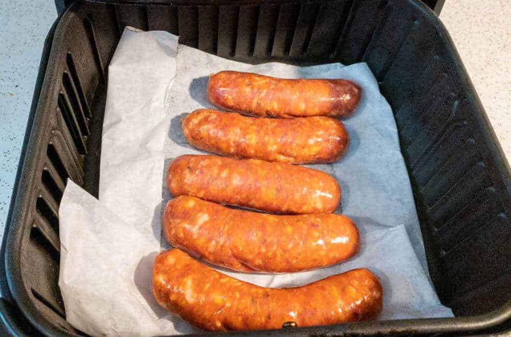 Italian sausage in the air fryer on parchment paper