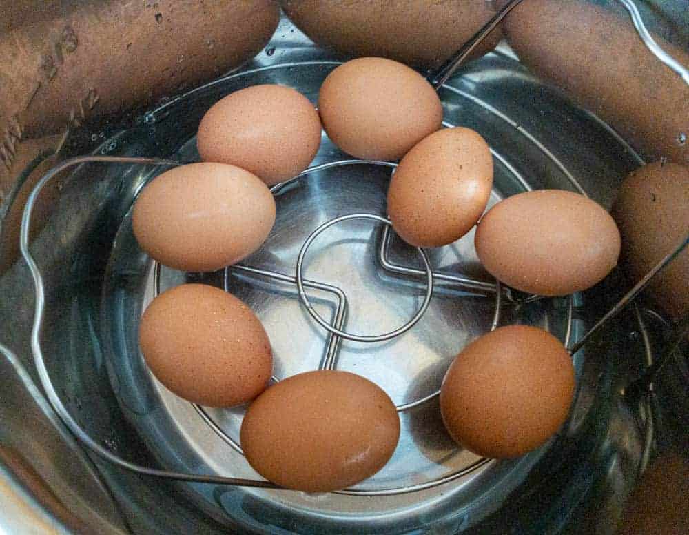 Eggs in Instant Pot on trivet to be hard boiled.