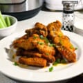 instant pot harissa wings featured close up