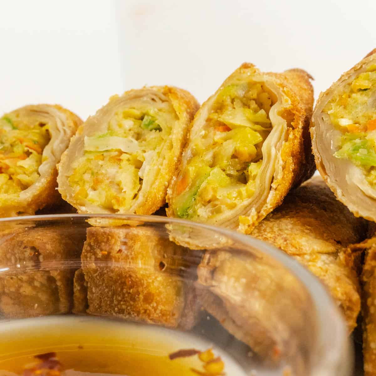 Front view of cooked frozen egg rolls.