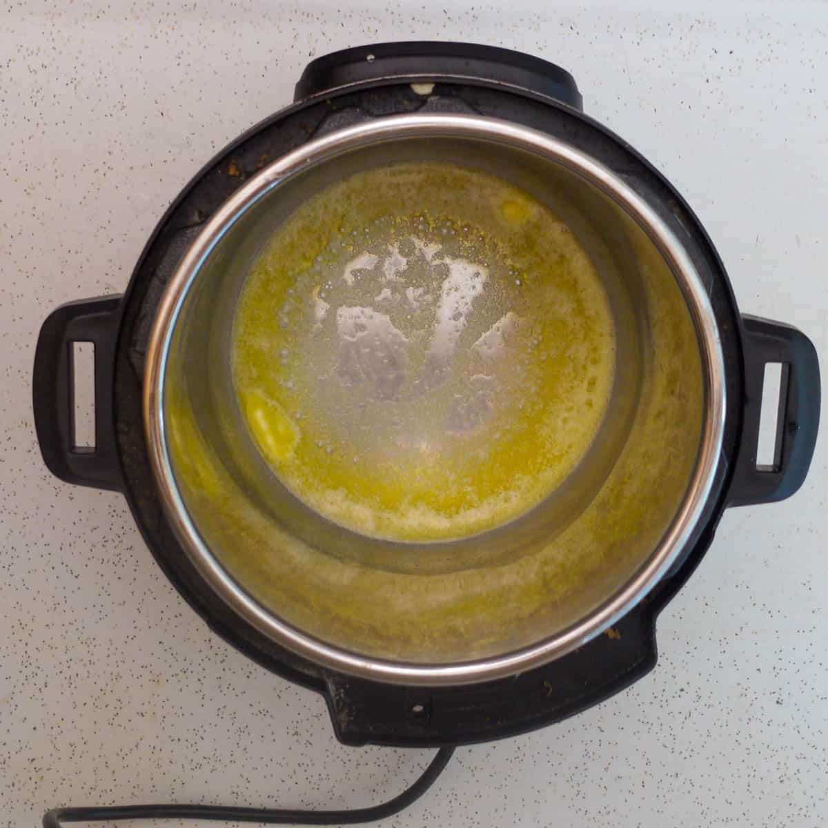 Rice pilaf melted butter in instant pot above view