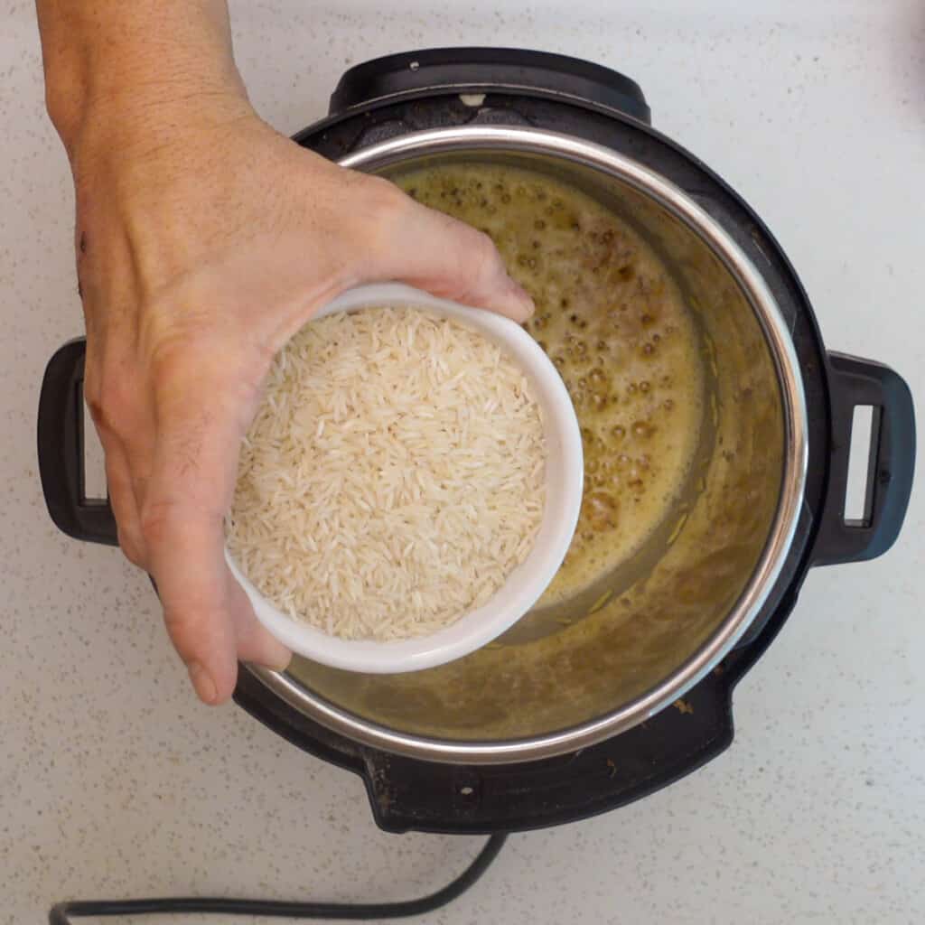 rice pilaf adding rice and toasting rice above view