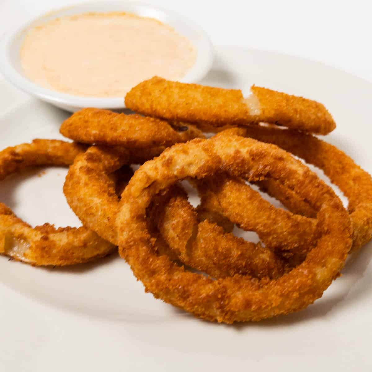 Air Fryer Frozen Onion Rings with Bloomin Onion Sauce - 40 Aprons