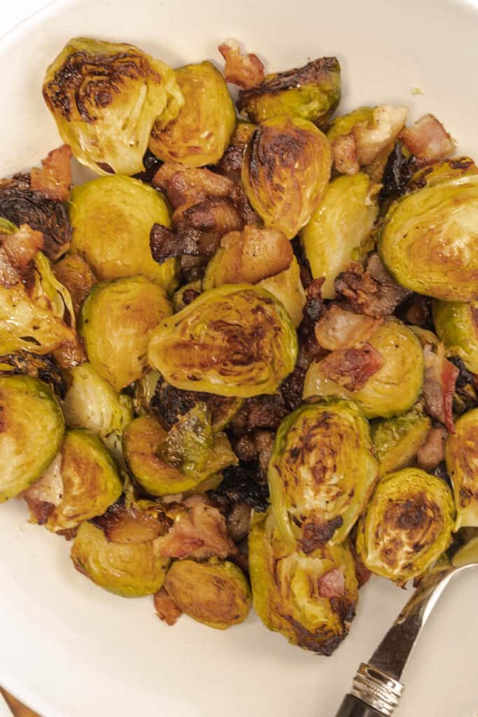 maple bacon roasted brussel sprouts in bowl close up