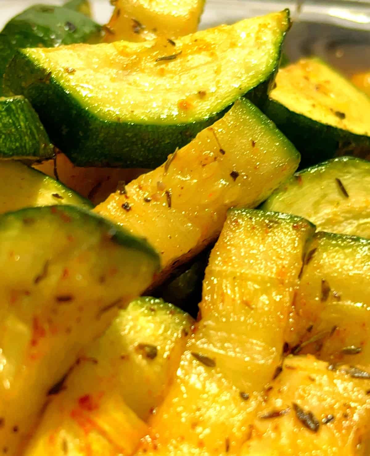 closeup of zucchini in the air fryer ready to eat