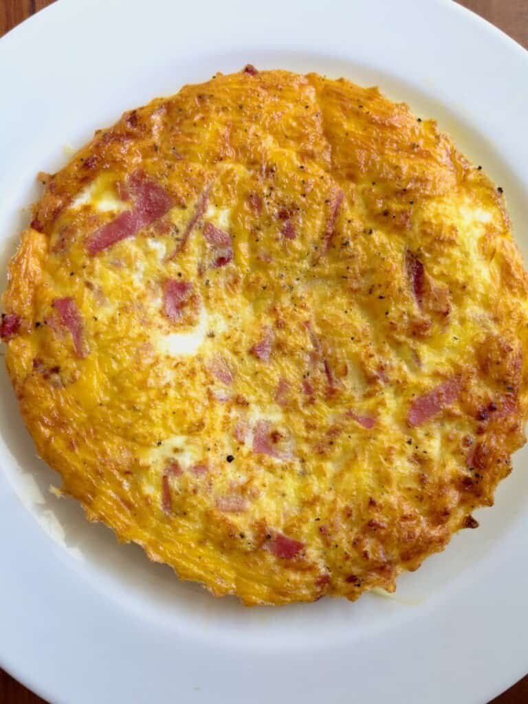 https://stuffmattycooks.com/wp-content/uploads/2023/09/air-fryer-ham-cheese-omelet-finished-768x1024.jpeg