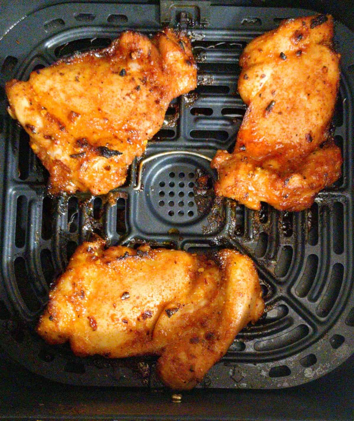 boneless skinless chicken thighs in air fryer basket