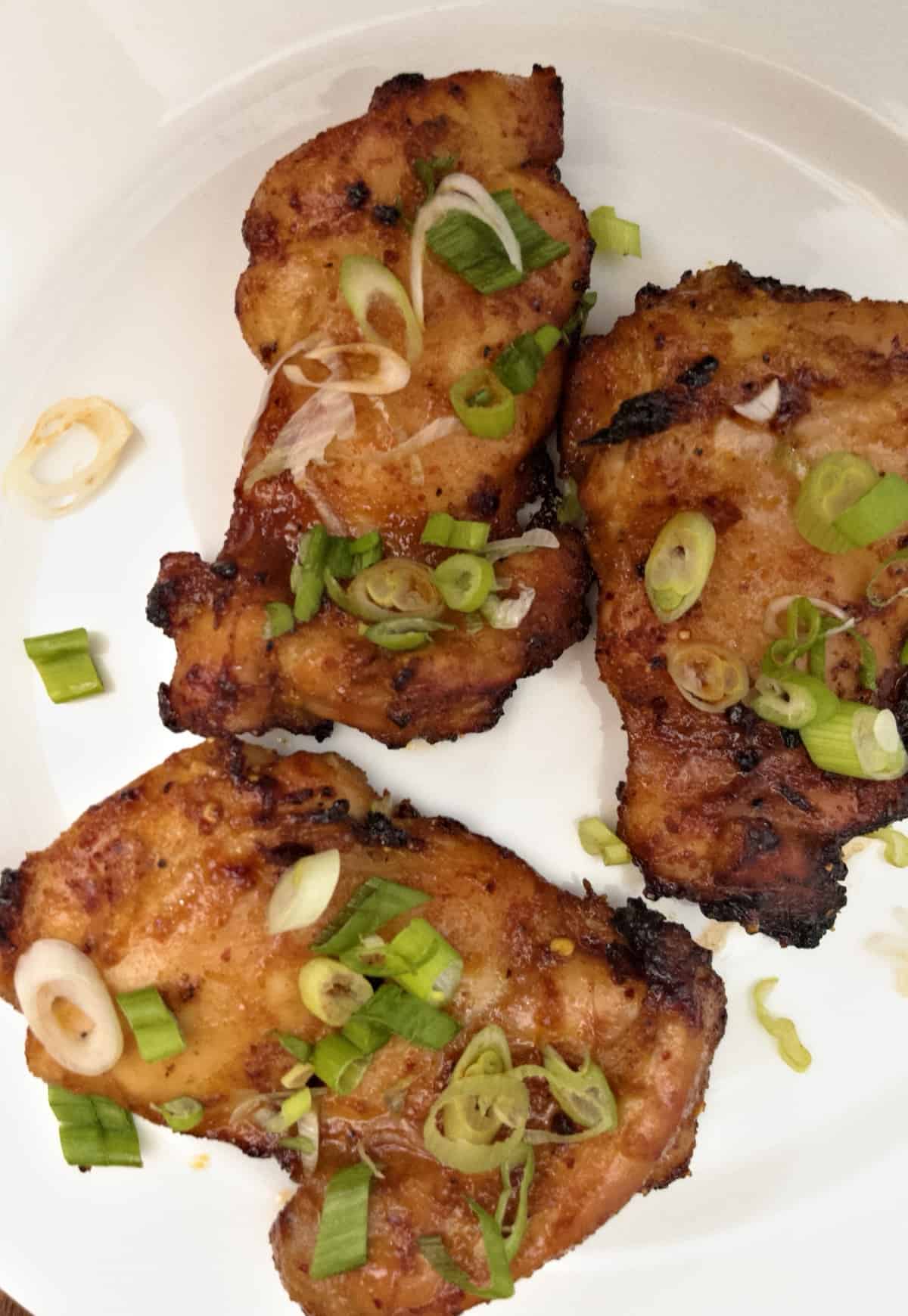 air fryer boneless chicken thighs finished on plate