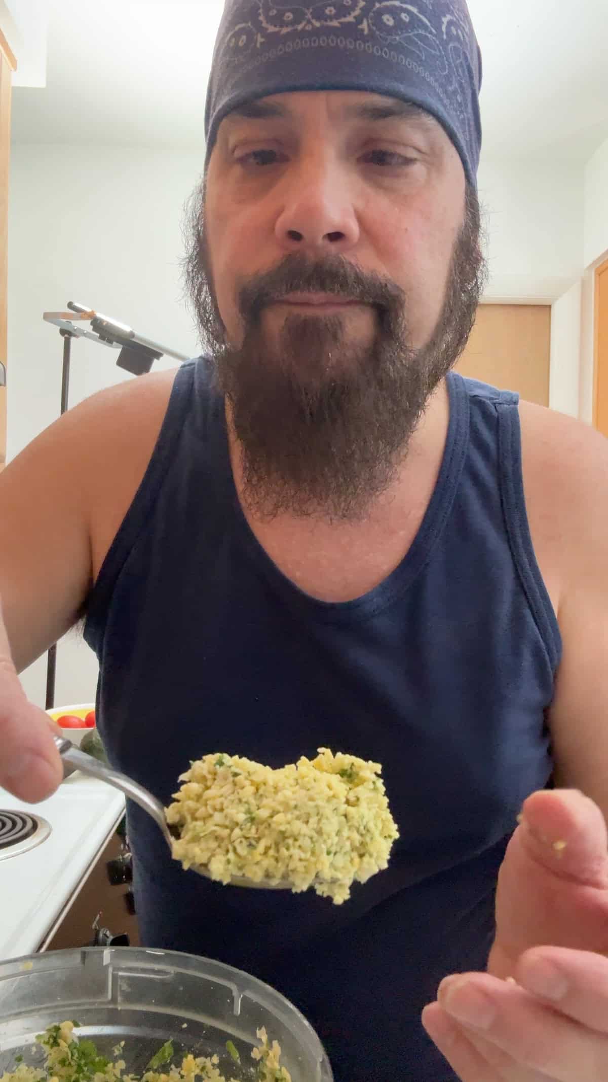 Scooping and shaping falafel mixture before air frying.