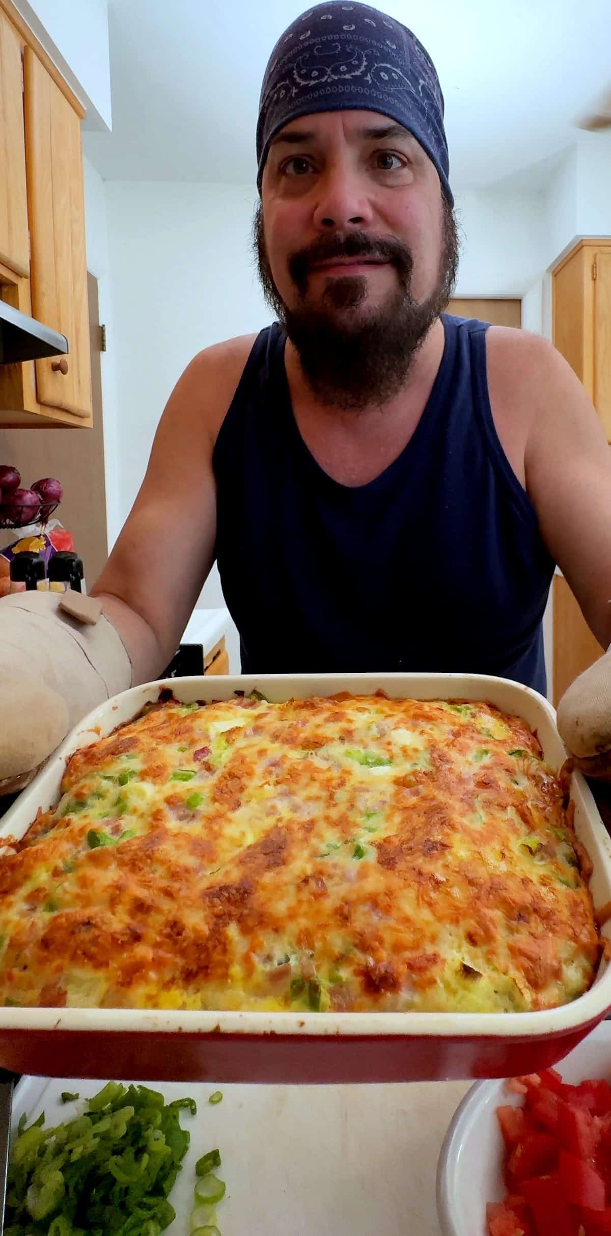 Baked hash brown breakfast casserole with golden melted cheese on top.